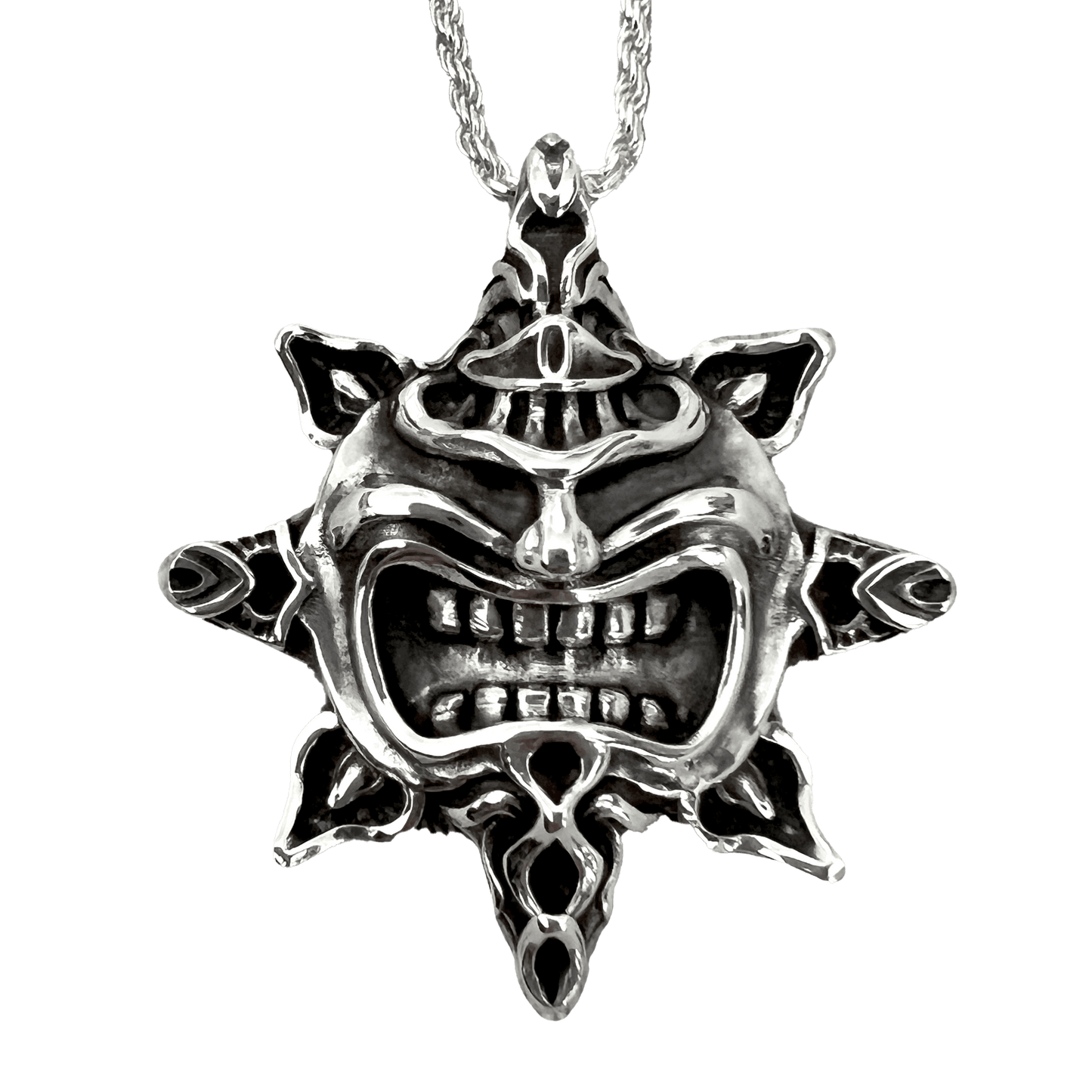 Premium, handmade solid sterling silver tiki-sun pendant. A fine example of luxury sterling silver Polynesian jewelry. 